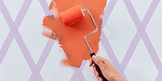 Apply a second paint color after placing your ScotchBlue™ Painter's Tape.
