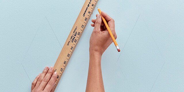 Draw shapes in pencil before applying painter's tape. Get advice from ScotchBlue™ Brand.
